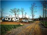 A row of travel trailers in RV sites at RINGLER FAMILY CAMPGROUND - thumbnail