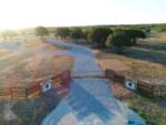 Sky view at entrance at Camp Pecan Bayou RV Park - thumbnail