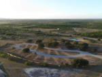 Overhead view of site Camp Pecan Bayou RV Park - thumbnail