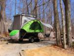 Parked 5th wheel at site Ash Grove Mountain Cabins and Camping - thumbnail