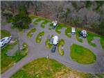 Aerial view with RVs parked in gravel sites at RURAL HILL FARM - thumbnail