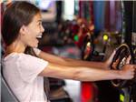 A girl having fun at the arcade near JETSTREAM RV RESORT AT THE MED CENTER - thumbnail