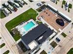 A drone shot of the main building, pool and more at JETSTREAM RV RESORT AT WALLER - thumbnail
