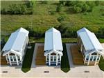 A drone shot of rental cottages at JETSTREAM RV RESORT AT WALLER - thumbnail
