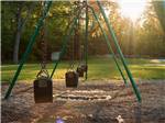 The kid's swing set at JETSTREAM RV RESORT AT WHARTON - thumbnail