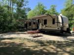 5th wheel in RV site at Coos Canyon Campground and Cabins - thumbnail