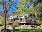 Two rental cabins perched on a hill - thumbnail
