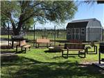 BBQ pit and fire pit sitting area at IRON HORSE RV RESORT - thumbnail