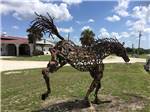 A horse made out of metal in front of the office at IRON HORSE RV RESORT - thumbnail