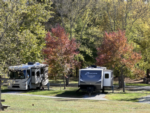 Two RVs parked by trees at The Resort at Boiling Springs - thumbnail