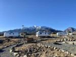 Vintage trailers and snow-capped mountains at MoonStream Vintage Campground - thumbnail