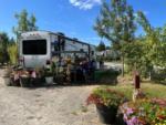 RV site with plants and flowers at North Haven Campground - thumbnail