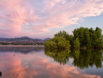 View of lake and mountains at North Shore RV Park & General Store - thumbnail