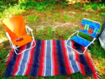 Bright colored chairs at Nowhere Campground and RV Park - thumbnail