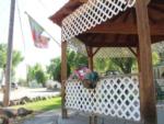 Gazebo with flowers at Four Seasons River Inn & RV Park - thumbnail