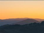 Mountain range at sunset at PIPESTEM RV PARK AND CAMPGROUND - thumbnail