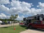 Parked trailers at site Plantation Place RV Park - thumbnail