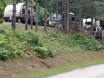 Parked RV and trailers at site Black Bear Resort - thumbnail