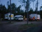Parked RV's at site Blessing Trails RV Park - thumbnail