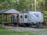 Parked RV with patio - thumbnail