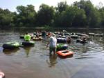 People floating on a river in intertubes - thumbnail