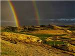A double rainbow over the golf course at INDIAN SPRINGS RANCH GOLF & RV RESORT - thumbnail