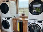 Washers and dryers in the laundry room at THE STATION RV RESORT - thumbnail