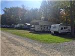 RVs and trailers parked on gravel sites at GLENDALE VALLEY CAMPGROUND - thumbnail