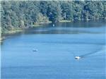 A couple of boats in the lake fishing at GLENDALE VALLEY CAMPGROUND - thumbnail