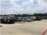 A row of trailers in paved sites at LAUREL SPRINGS RV RESORT - thumbnail