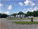 A few of trailers parked in gravel sites at KELLY CREEK RV PARK - thumbnail