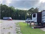 A trailer hooked up in site number thirteen at KELLY CREEK RV PARK - thumbnail