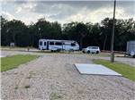 Another view of an empty site at KELLY CREEK RV PARK - thumbnail