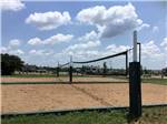 The sand volleyball court at SCHATZILAND RV RESORT - thumbnail