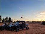 Three ATVs in a line nearby at SETTLERS JUNCTION RV PARK - thumbnail