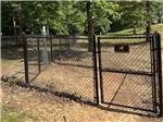 The fenced in pet area at BLAKE FARMS FAMILY RV RESORT - thumbnail