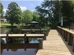 The walking path to the docks at TWO CREEKS CROSSING RV RESORT - thumbnail