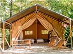The front view of one of the glamping tents at DANCING FIRE GLAMPING AND RV RESORT - thumbnail