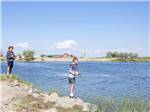 Two boys fishing at the lake at LUCKY LAKE 208 - thumbnail