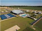 Aerial view of the office, swimming pool and shuffleboard courts at GRAND RIVIERA RV RESORT - thumbnail