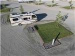 Aerial view of a RV in a site at WHISPERING RIVER RANCH RV PARK - thumbnail