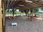 Picnic benches under the pavilion at BOTEL CAMPGROUND - thumbnail