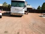 Parked RV's at site Country Rose RV Park - thumbnail