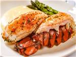A plate of food with lobster tail at SPIRIT MOUNTAIN CASINO RV PARK - thumbnail