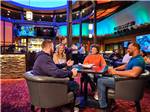 A group of people sitting in the bar at SPIRIT MOUNTAIN CASINO RV PARK - thumbnail