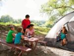 Table with tent campers at WILD ADVENTURES SAFARI CAMPGROUND - thumbnail