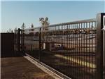 The front entrance metal gate at BIRDIE RV PARK - thumbnail