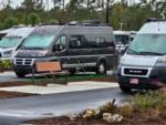 A Class B motorhome parked in a site at SANTA FE PALMS RV RESORT - thumbnail