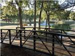 A bridge over a pond at STARRY NIGHT RV RESORT - thumbnail