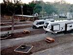 A view of two trailers in gravel sites at STARRY NIGHT RV RESORT - thumbnail